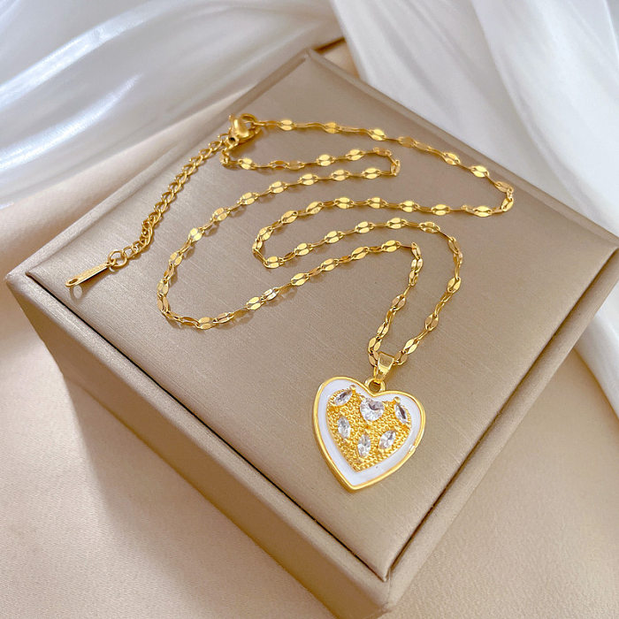 Luxuoso formato de coração em aço inoxidável com revestimento de cobre embutido com pedras preciosas artificiais colar com pingente