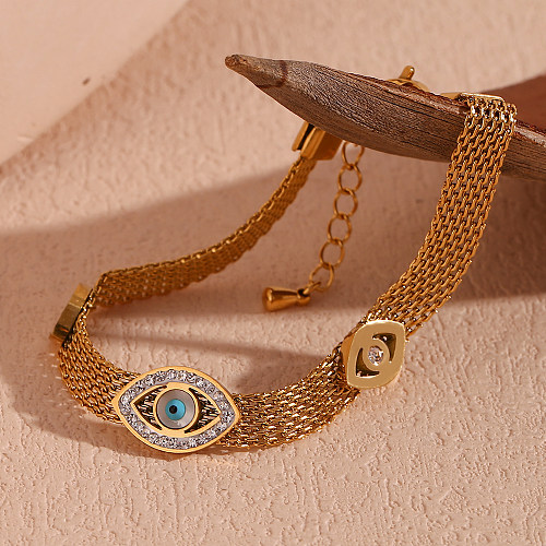 Bracelets plaqués or 18 carats avec incrustation de strass en acier inoxydable pour les yeux de style classique de style simple