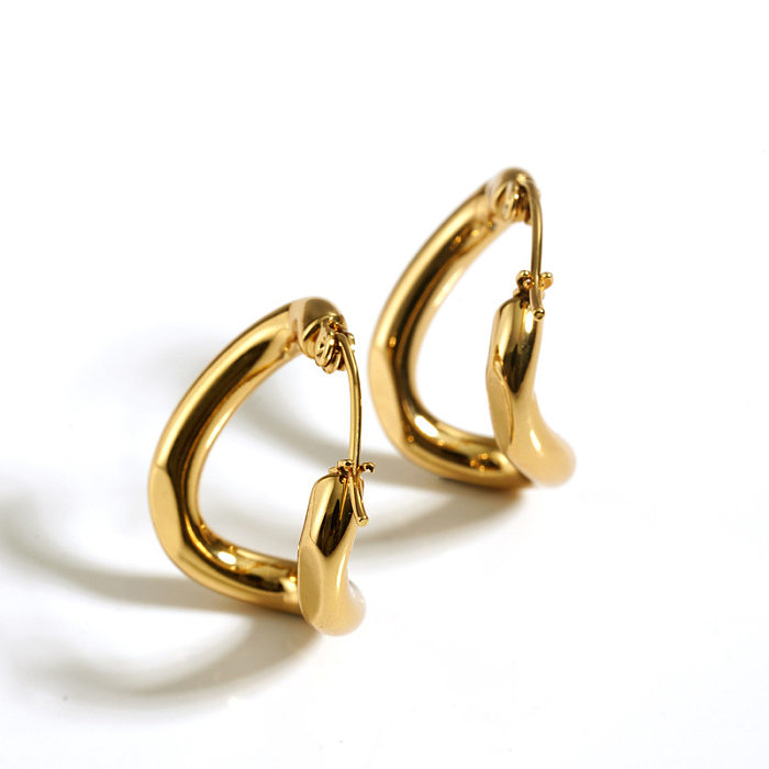 1 paire de boucles d'oreilles décontractées de style moderne et classique en acier inoxydable plaqué or 14 carats.