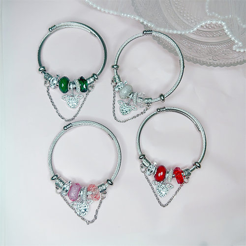 Brazalete de diamantes de imitación con incrustaciones de chapado en resina de aleación de acero inoxidable con forma de corazón dulce estilo IG