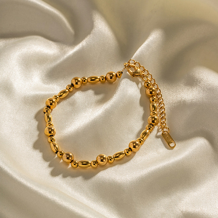 Elegantes pulseiras redondas banhadas a ouro 18K com revestimento de aço inoxidável