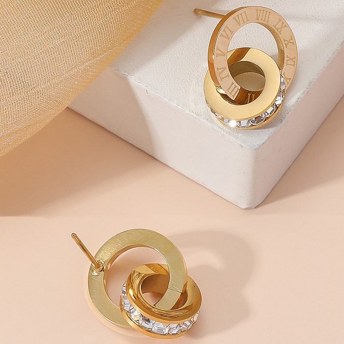 1 par de pendientes chapados en oro de 18 quilates con incrustaciones de diamantes de imitación chapados en acero inoxidable con número circular de estilo Simple