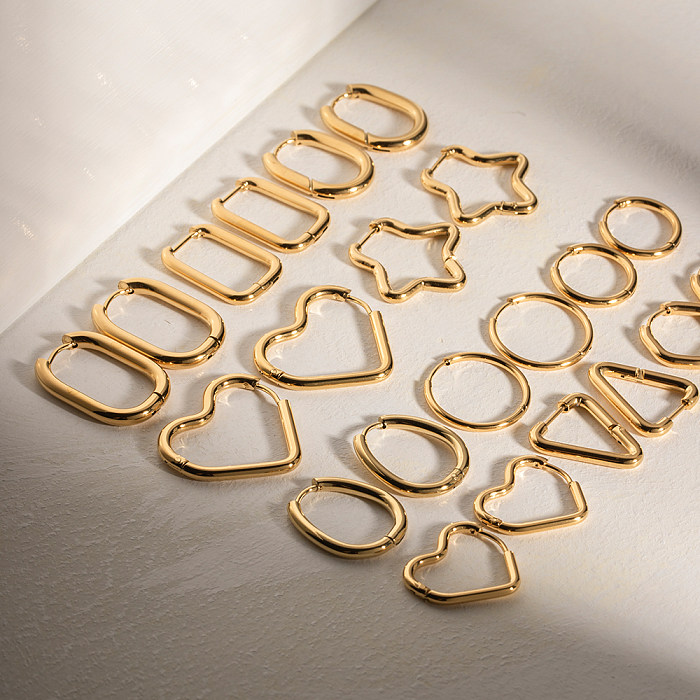 1 par de pendientes chapados en oro de 18 quilates de acero inoxidable con forma de corazón y estrella estilo IG