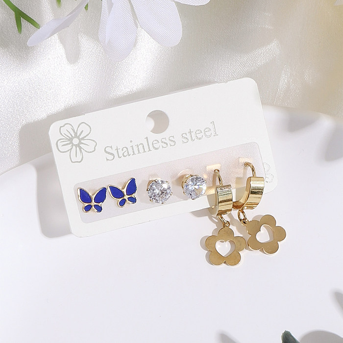 3 paires de boucles d'oreilles pendantes en acier inoxydable et diamant artificiel plaqué or avec incrustation de papillon mignon