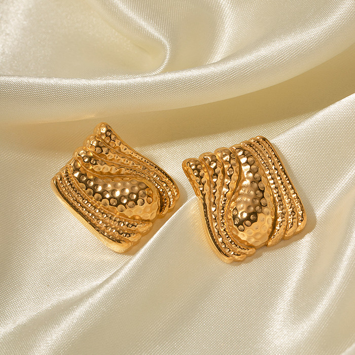 1 paire de clous d'oreilles de style romain rétro en acier inoxydable plaqué or 18 carats.