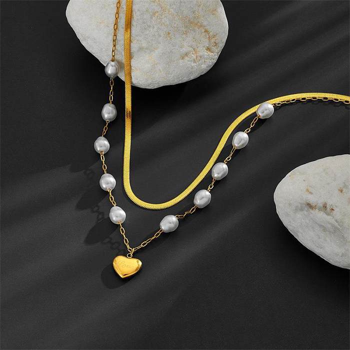 Elegante herzförmige Halsketten mit Edelstahlbeschichtung und Intarsien aus künstlichen Perlen