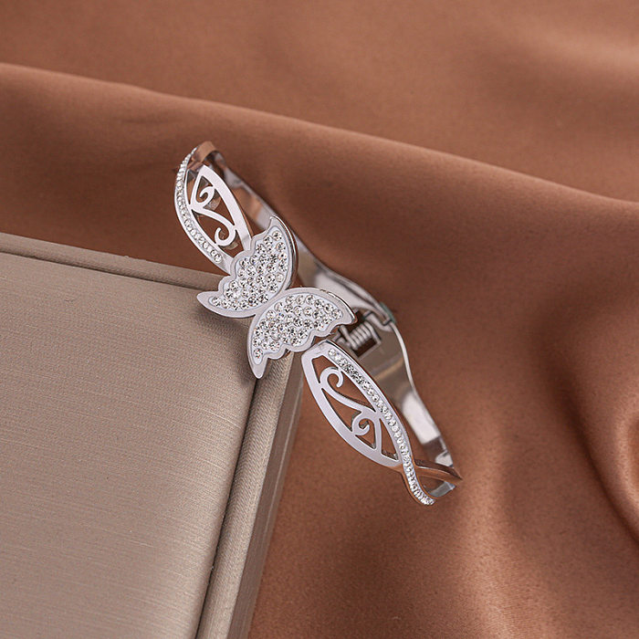 Lady Butterfly Manschettenarmbänder aus Titanstahl mit Inlay und Zirkon