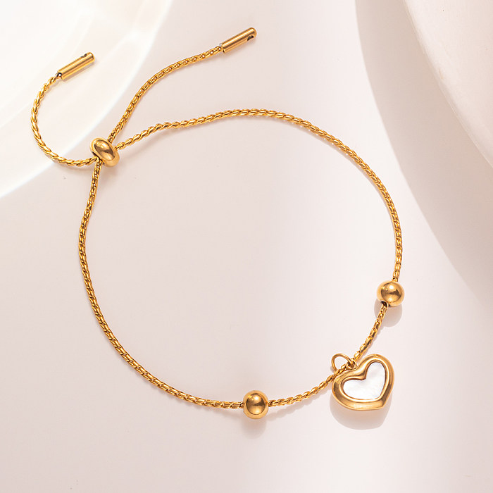 Pulseiras banhadas a ouro 18K com revestimento de aço em forma de coração estilo elegante e simples
