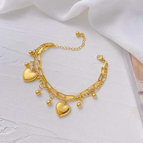 Pulseras chapadas en oro de titanio con revestimiento de acero en forma de corazón de estilo simple