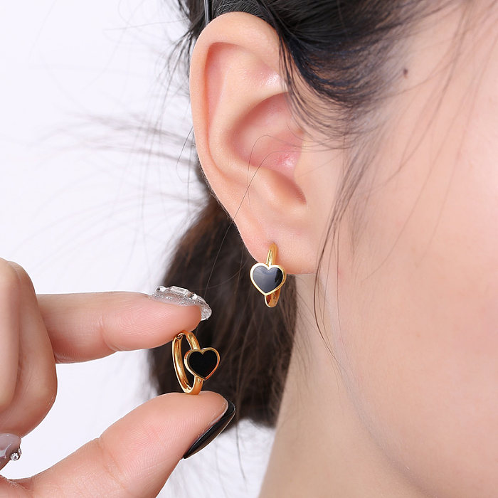 1 paire de boucles d'oreilles créoles plaquées or 18 carats, style moderne et simple, en forme de cœur, en acier inoxydable