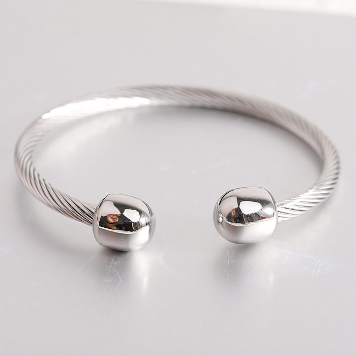 Bracelet de câble torsadé par placage en acier inoxydable à rayures en spirale en forme de C de style simple