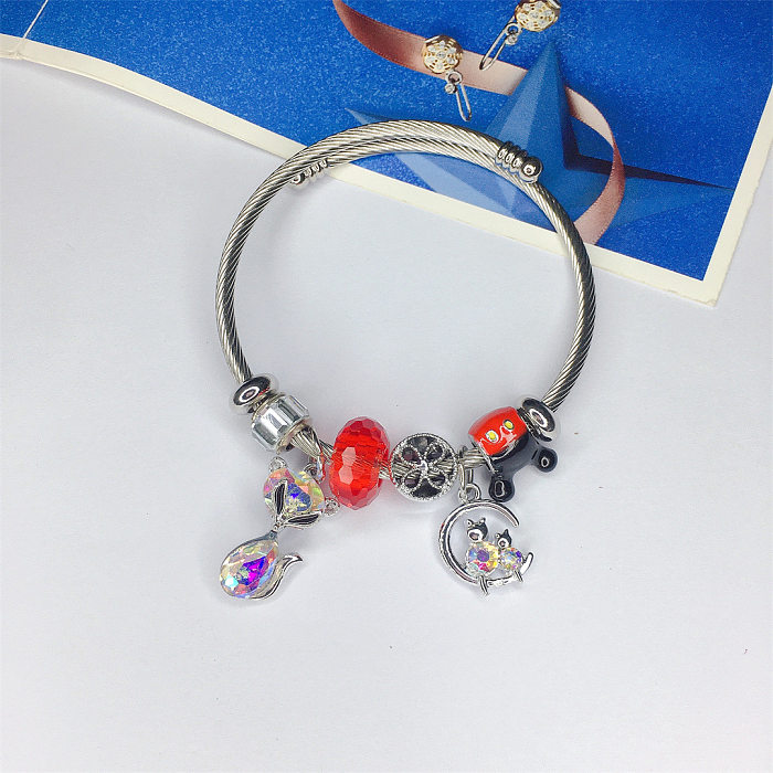 Bracelet de pierres précieuses artificielles d'incrustation de placage d'acier de titane de papillon de style simple