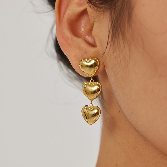 1 paire de boucles d'oreilles pendantes plaquées or 18 carats en forme de cœur de Style INS