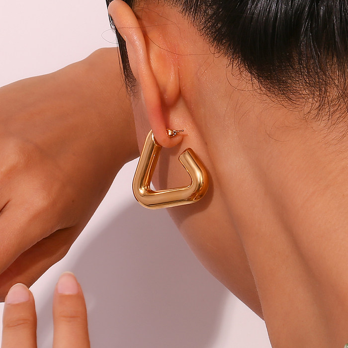 1 paire de boucles d'oreilles en acier inoxydable plaqué or 18 carats, style simple et classique
