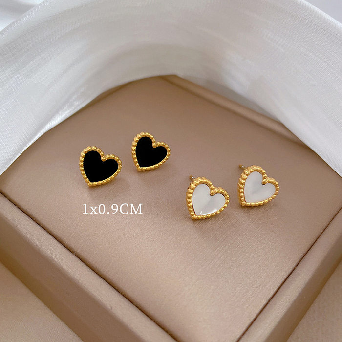 1 par de brincos de orelha de aço inoxidável em formato de coração estilo moderno simples