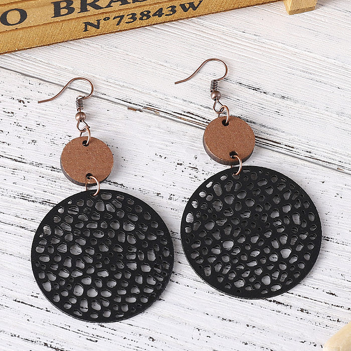 1 Pair Ethnic Style Round Patchwork Hollow Out Stainless Steel  Wood Drop Earrings