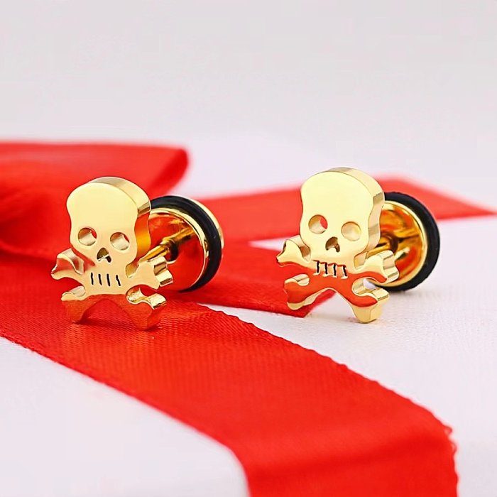 1 par de aretes chapados en oro de 18 quilates de acero inoxidable con revestimiento de calavera retro