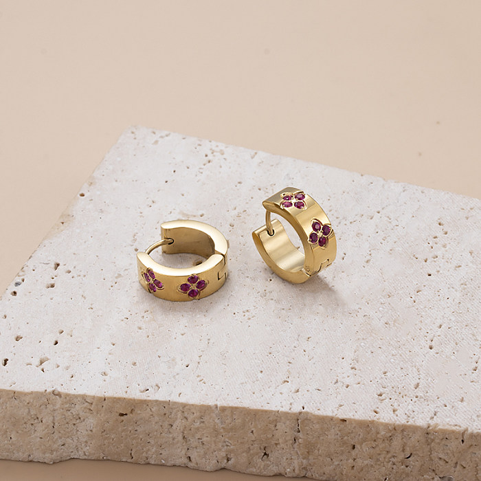 1 par de aretes chapados en oro de 18K con incrustaciones de circonio y flor de ojo redondo elegante y Glam