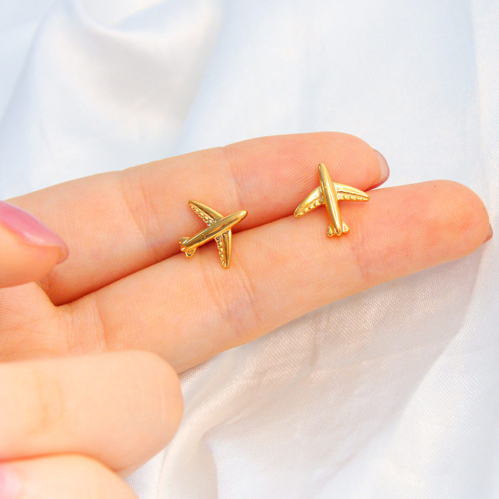 1 par de brincos de orelha banhados a ouro com revestimento de aço inoxidável de avião de estilo simples
