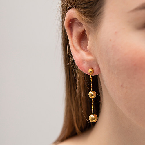 1 paire de boucles d'oreilles pendantes élégantes en acier inoxydable plaqué or 18 carats
