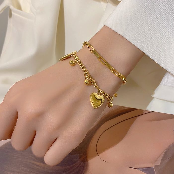 Bracelets plaqués or en acier titane en forme de cœur de style simple