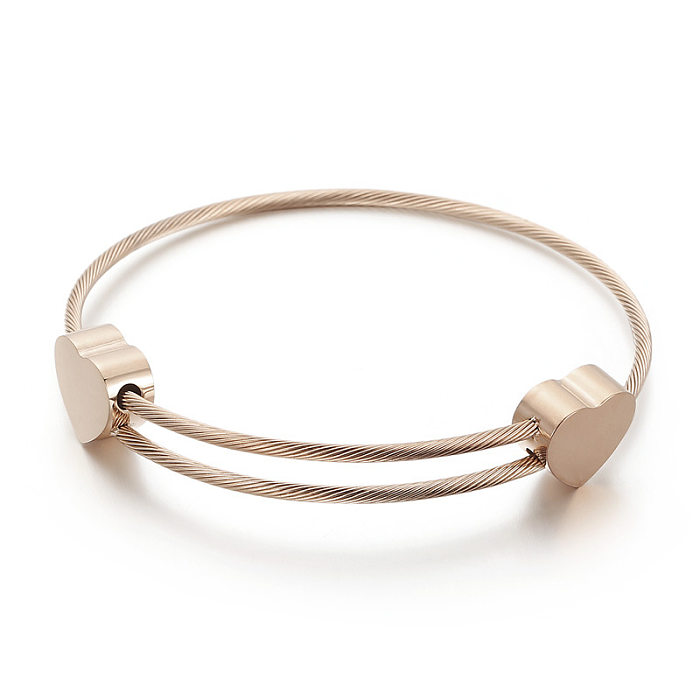 Bracelets en acier inoxydable de placage de bracelet en acier au titane en forme de coeur de mode