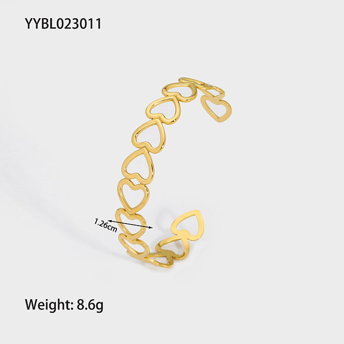 Moderner, geometrischer, herzförmiger Schlangen-Armreif mit Edelstahlbeschichtung und vergoldetem Armreif