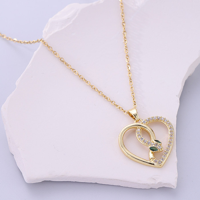 Collar chapado en oro de 18 quilates con incrustaciones de acero inoxidable y serpiente en forma de corazón de estilo coreano