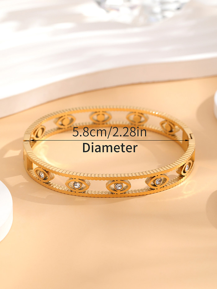 Brazalete chapado en oro de diamantes de imitación con incrustaciones de epoxi de acero de titanio con ojo artístico de estilo francés