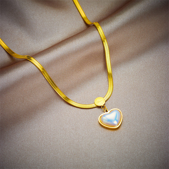 Collier pendentif élégant en forme de cœur en acier inoxydable avec incrustation en acrylique plaqué or 18 carats