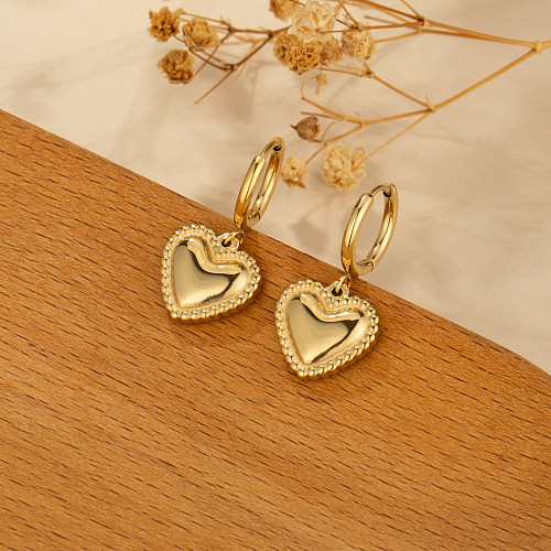 1 par de brincos de gota banhados a ouro de aço inoxidável estilo simples e doce em forma de coração