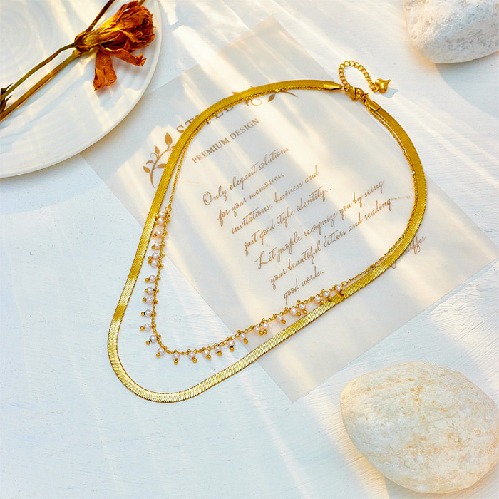 Elegante, mehrschichtige Halsketten mit geometrischem Edelstahl-Inlay und künstlichen Perlen, 18 Karat vergoldet