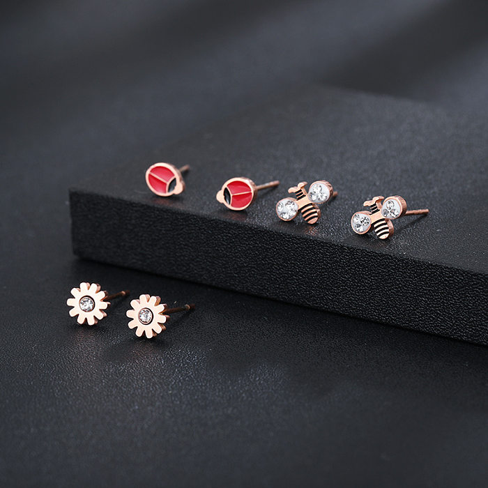 Pendientes con incrustaciones de diamantes de imitación de acero inoxidable con nudo de lazo de mariposa en forma de corazón a la moda, 3 pares