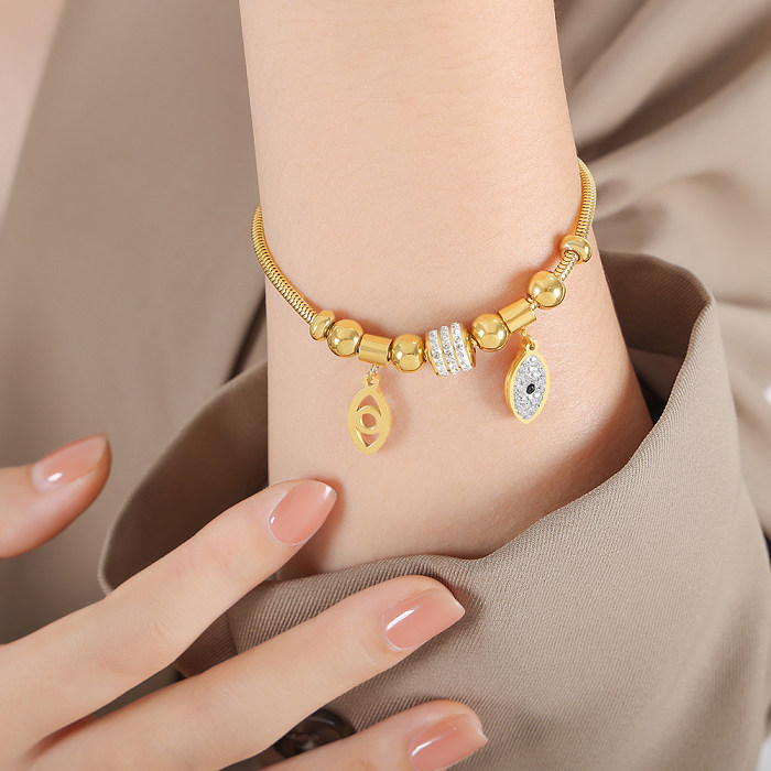 Luxuosas pulseiras de zircão banhadas a ouro 18K em formato de coração estilo britânico em aço titânio a granel