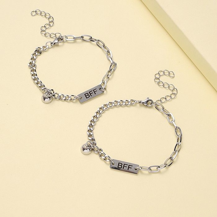 1 paire de bracelets faits à la main en acier inoxydable avec lettres à la mode
