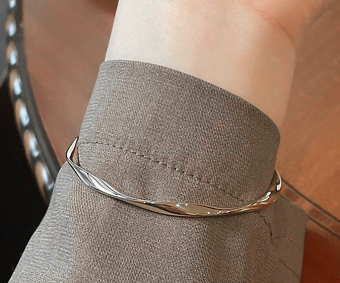 Bracelet en acier titane irrégulier de style simple en vrac
