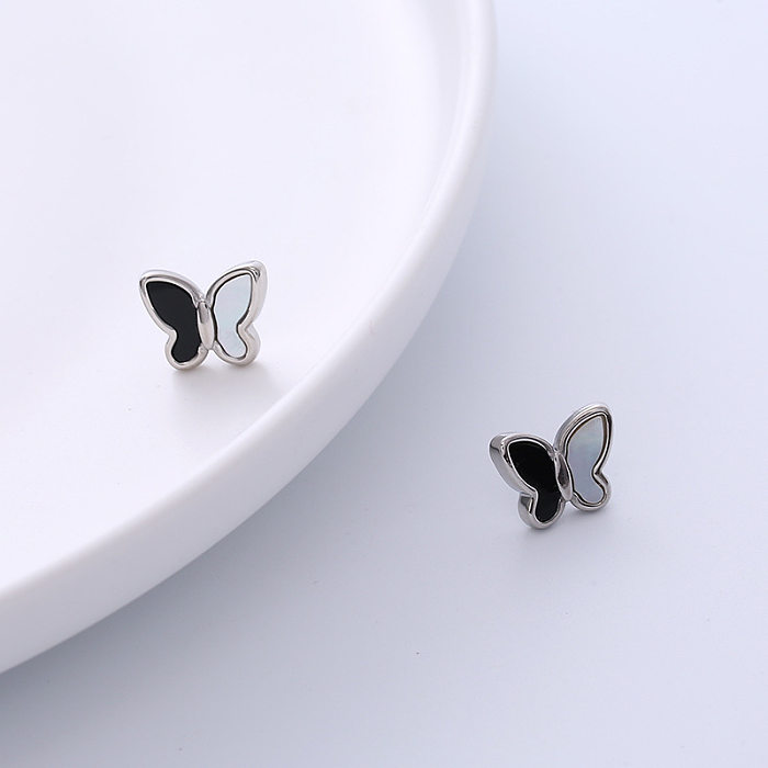 Pendientes de acero inoxidable con diseño de mariposa dulce