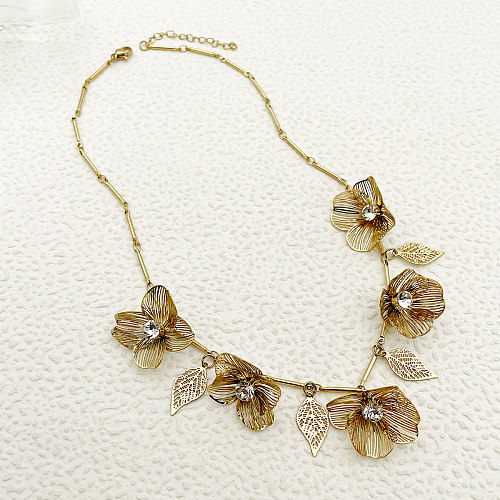 Estilo vintage estilo romano flor chapeamento de aço inoxidável oco colar banhado a ouro