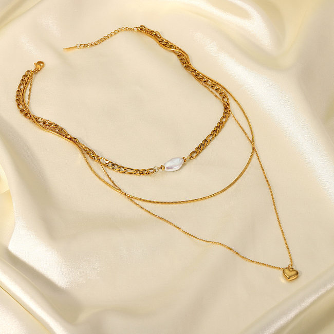 Collier en acier inoxydable à trois couches avec pendentif en forme de cœur et de perles