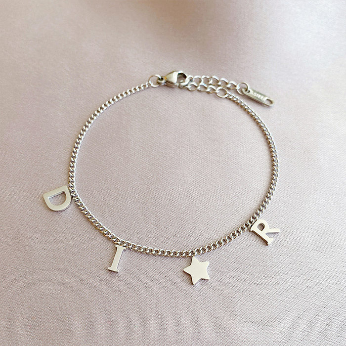 Bracelets en acier titaniques d'étoile de lettre de style simple plaquant des bracelets d'acier inoxydable