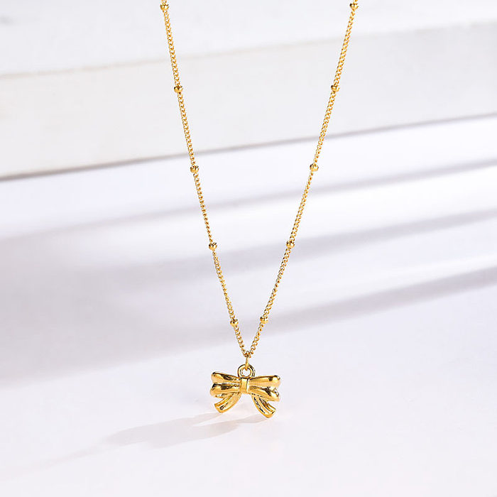 Süße Schleifenknoten-Anhänger-Halskette aus Edelstahl mit 18-Karat-Vergoldung
