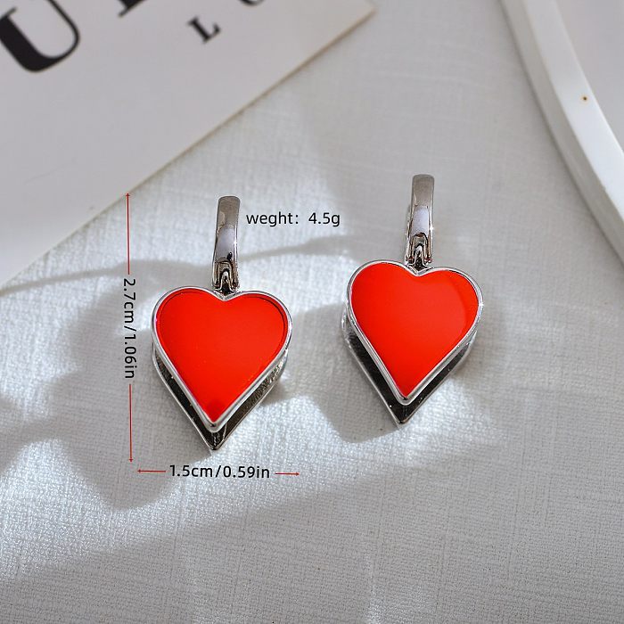 1 par de brincos de aço inoxidável esmaltados em forma de coração estilo simples