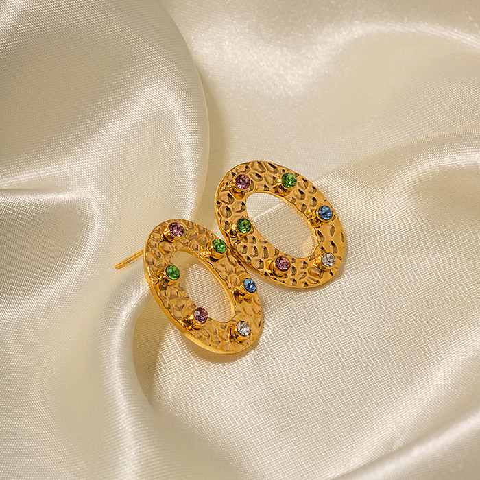 1 par de elegantes pendientes ovalados chapados en acero inoxidable con incrustaciones huecas de diamantes artificiales chapados en oro de 18 quilates