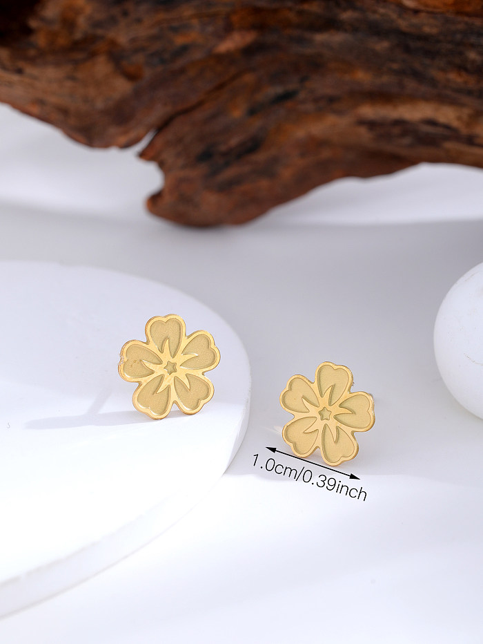 1 paire de clous d'oreilles plaqués or 18 carats en acier inoxydable avec placage de fleurs de style simple