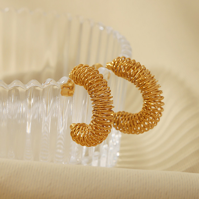 Europäische und amerikanische übertriebene goldene Twist-Hohlstahldraht-Wickel-C-förmige Edelstahl-Echtgold-Ohrringe aus 18 Karat