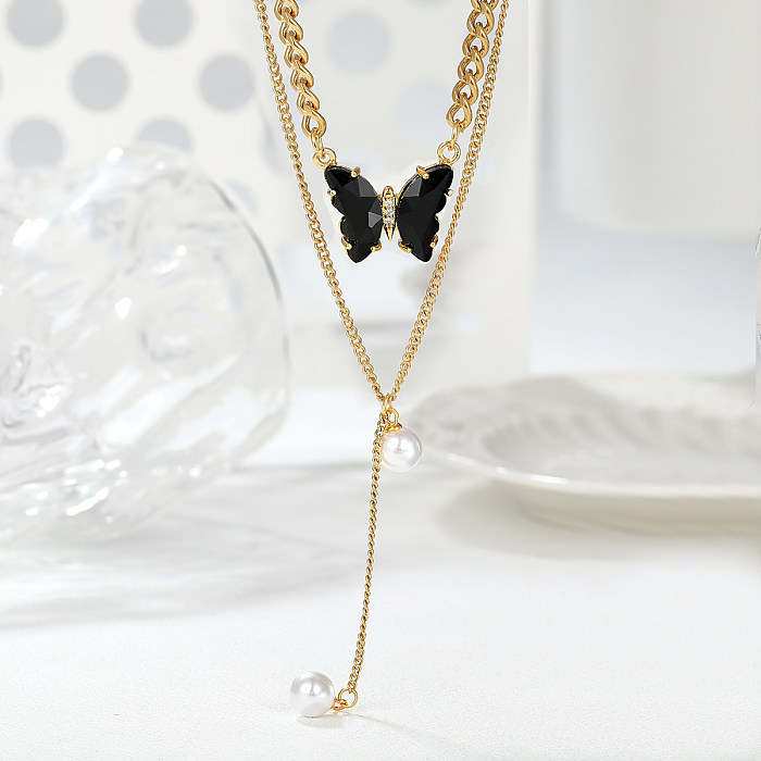 Collares en capas chapados en oro de 18 quilates con incrustaciones de perlas artificiales de mariposa dulce romántica