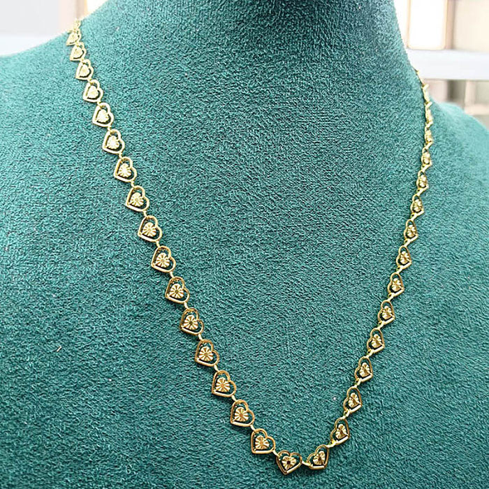 Lässiger, moderner Stil, herzförmige Halskette aus Edelstahl mit Polierbeschichtung, ausgehöhlt, 18 Karat vergoldet