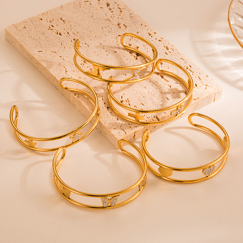 Brazalete chapado en oro de 18 quilates con incrustaciones de acero inoxidable y mariposa con forma de corazón y pentagrama elegante estilo IG