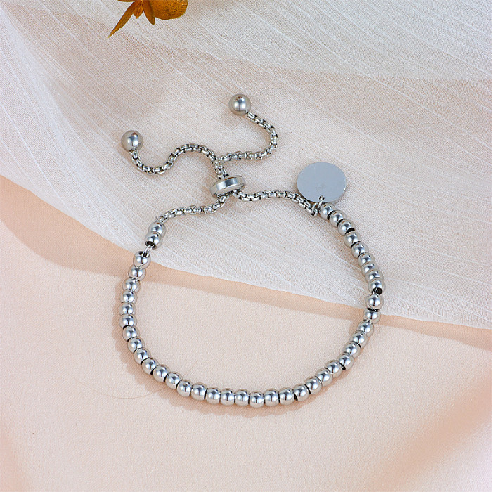 Einfache, einfarbige Armbänder aus Titanstahl mit Perlen