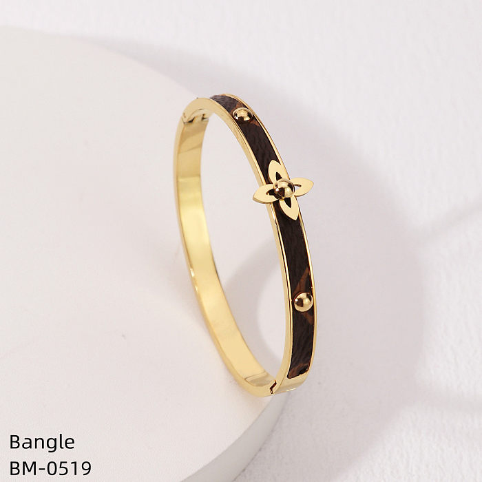 Bracelet plaqué or en acier inoxydable avec fleur ronde rétro pour dame